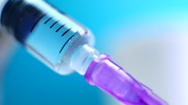 Doctors-with-syringe,-injection-in-hospital