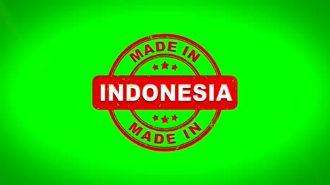 Made-In-Indonesien-unterzeichnet,-Stanz-hölzernen-Stempel-Textanimation.-Roter-Tinte-auf-Clean-White-Paper-Oberfläche-Hintergrund-mit-grünen-matten-Hintergrund-enthalten.