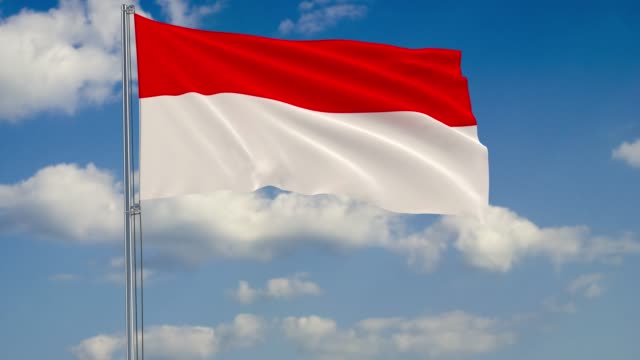 Flagge-von-Indonesien-vor-Hintergrund-Wolken-am-blauen-Himmel-schweben
