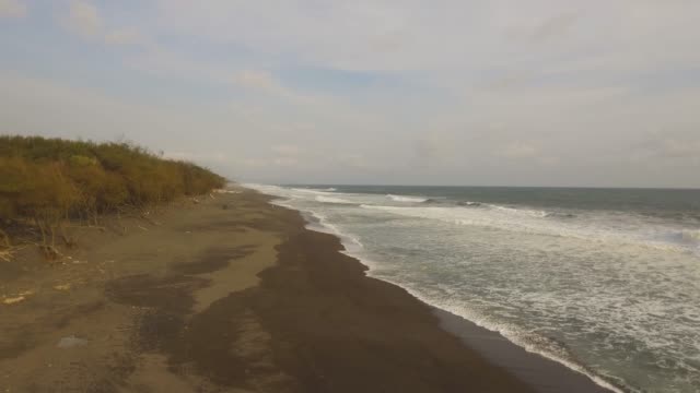sandy-beach-near-the-ocean
