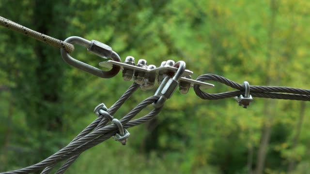 Safety-equipment-carabiner-and-ropes-for-climbing-trees-in-extreme-park