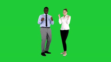 International-happy-smiling-man-and-woman-showing-thumbs-up-on-a-Green-Screen,-Chroma-Key
