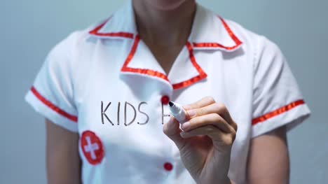 Kids-health,-Female-doctor-writing-on-transparent-screen