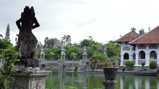 Taman-Ujung-water-palace,-which-is-situated-near-the-ocean-and-decorated-by-beautiful-tropical-garden,-Bali,-Indonesia.