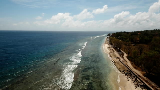 Aerial-view-beautiful-beach-on-a-tropical-island.-Nusa-Penida,-Bali,-Indonesia