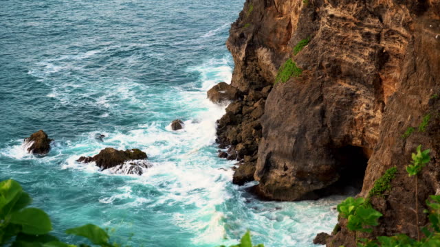 Uluwatu-stone-cliffs,-ocean-waves.-Aerial-top-view.-Bali,-Indonesia.