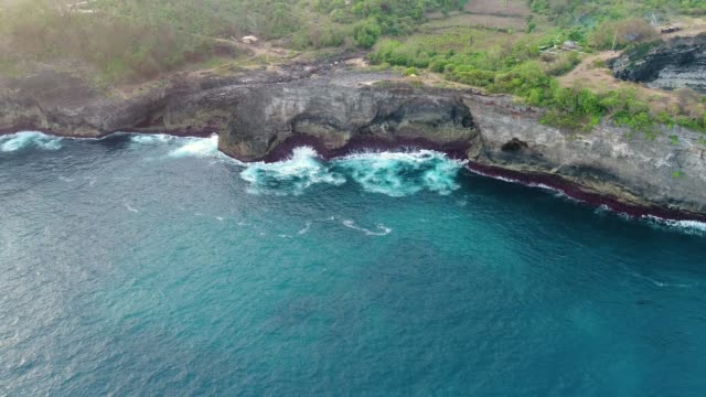 Aerial-view-by-drone-4k-camera.-Rocky-coast-with-high-cliffs