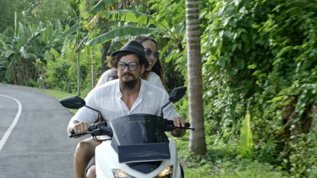 Beautiful-Couple-Having-Romantic-Road-Trip-on-Scooter