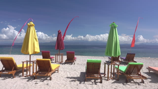 Empty-Sunbeds-and-Umbrellas-on-the-Beach.-Fast-Motion