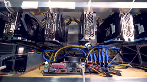 Row-of-bitcoin-miners.-Mining-farm-with-lots-of-videocards.