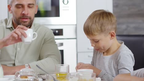 Father-Taking-Care-of-Kid-at-Breakfast