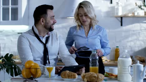 Wife-serving-breakfast-to-her-husband