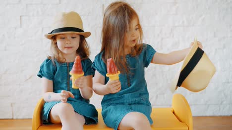 girls-eat-ice-cream-at-home-while-waiting-for-vacation