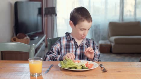 Child-nutrition---boy-refusing-to-eat-healthy-food