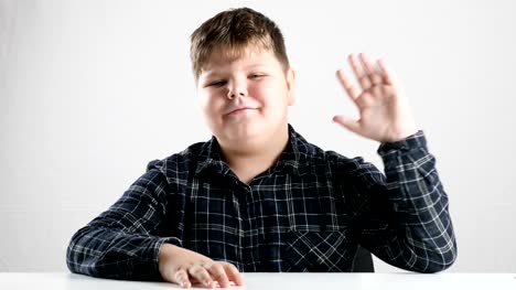 Young-fat-boy-waving-his-arm,-hello-sign-50-fps