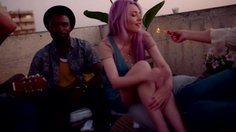 Multi-ethnic-hipster-friends-having-fun-at-rooftop-summer-party