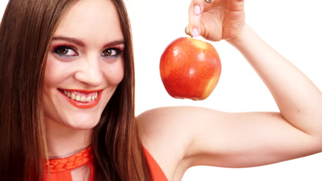Woman-charming-girl-colorful-makeup-holds-apple-fruit-4K