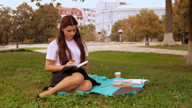 girl-eating-snack-outdoor