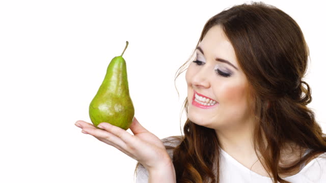 Woman-holding-pear-fruit,-isolated.-Healthy-diet.