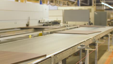 chipboards-on-conveyer-at-furniture-factory