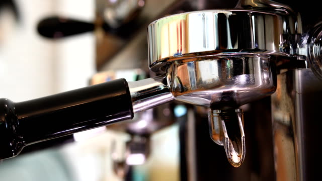 coffee-grinder-machine-in-cafe-restaurant