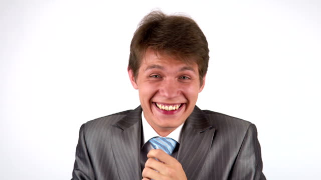 Businessman-with-a-laughing-and-looking-at-the-camera