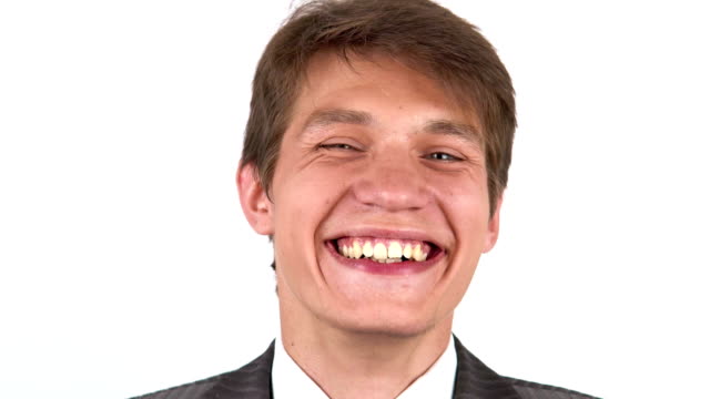 Businessman-with-a-laughing-and-looking-at-the-camera