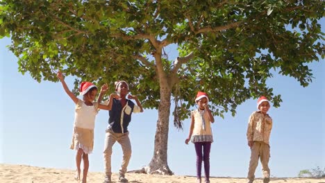 Kids-jumping-with-joy-and-dancing-for-holiday-Christmas-WS