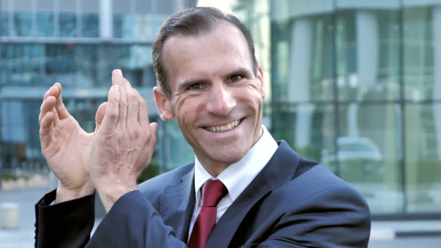 Applauding-Sucessful-Businessman,-Clapping