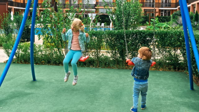 Happy-boy-having-fun-in-kids-amusement-park