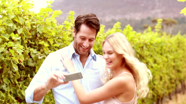 Happy-smiling-couple-taking-a-selfie