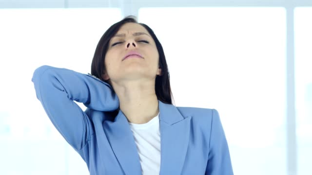 Young-Businesswoman-at-Work-with-Neck-Pain,-Workload