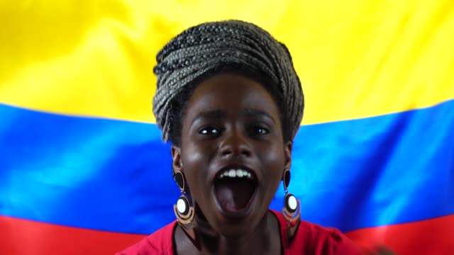 Colombian-Young-Black-Woman-Celebrating-with-Colombia-Flag