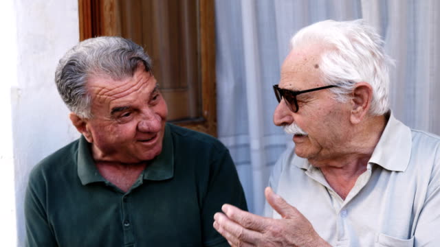 happy-and-smiling-old-men-talking