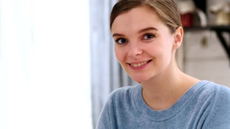 Close-Up-of-Smiling-Positive-Beautiful-Young-Woman-Model-at-Home