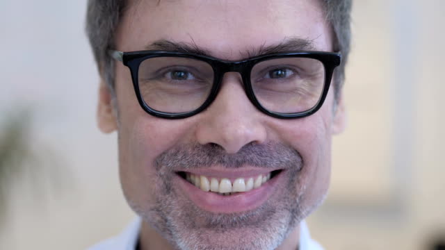 Close-up-of-Smiling-Face-of-Middle-Aged-Man
