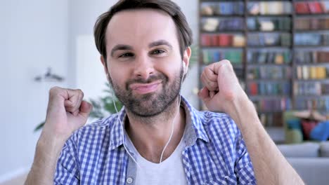 Happy-Casual-Beard-Man-Listening-Music-on-Headphones-and-Dancing-with-Joy-,4k-,-high-quality