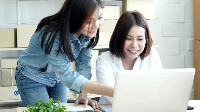 Asian-woman-working-together-at-home.-Woman-startup-for-business-together.-People-working-with-SME,-Online-Business,-Startup-business-concept.