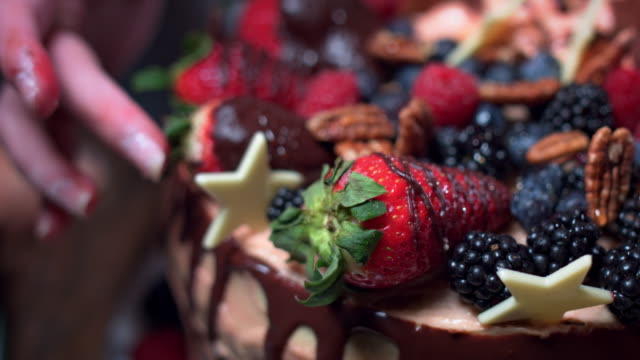 4K-Cake-Baker-Arranging-Strawberries-on-Top