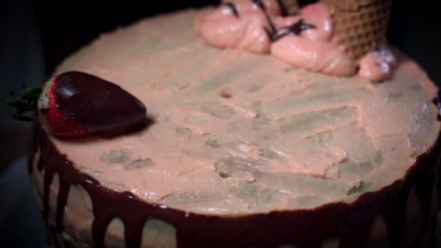 4K-Cake-Baker-Decorating-with-Strawberries