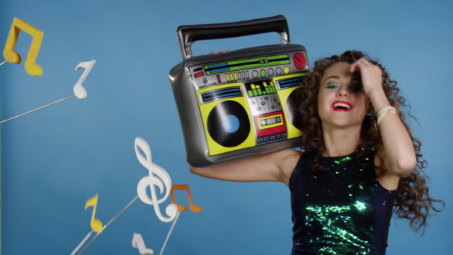 Woman-with-inflatable-tape-recorder