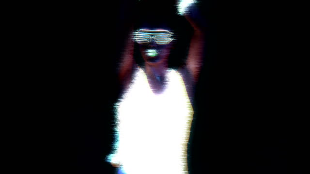 Woman-with-UV-face-paint,-glowing-clothing,-glowing-glasses,-bracelet-dancing-in-front-of-camera,-half-body-shot.-Asian-woman.-Glitch-effect.-Women.
