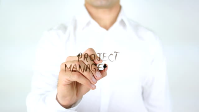 Project-Management,-Man-Writing-on-Glass