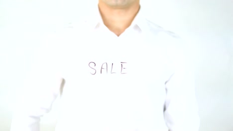 Sale,-Man-Writing-on-Glass