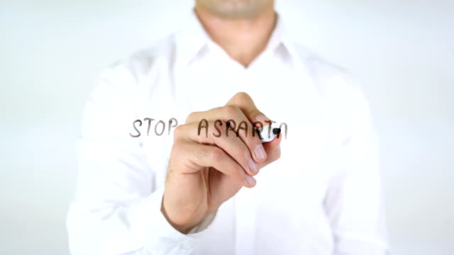 Stop-Aspartame,-Man-Writing-on-Glass