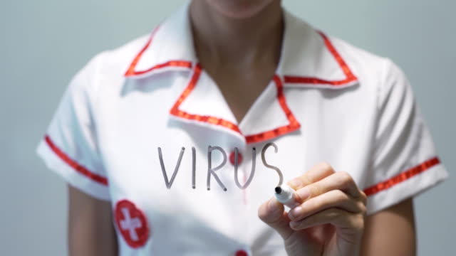 VIRUS,-Female-doctor-writing-on-transparent-screen