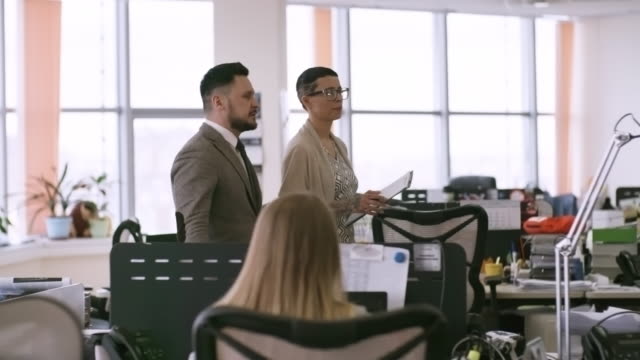 Businesswoman-Showing-Office-to-Male-Colleague