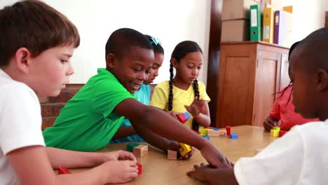 Pupils-playing-with-building-blocks-in-classroom