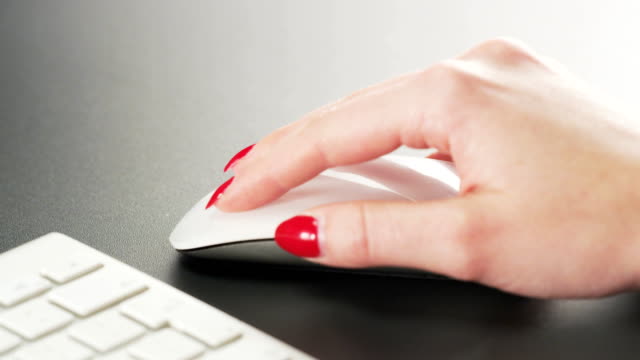 Woman-Using-Computer-Mouse