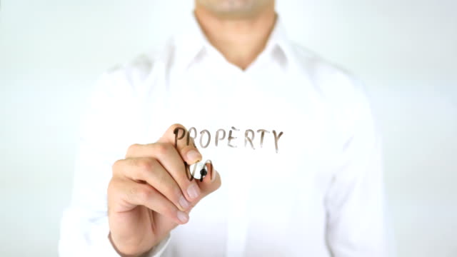 Property-Value,-Man-Writing-on-Glass